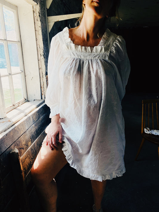Sleeper mini dress in broderie anglaise