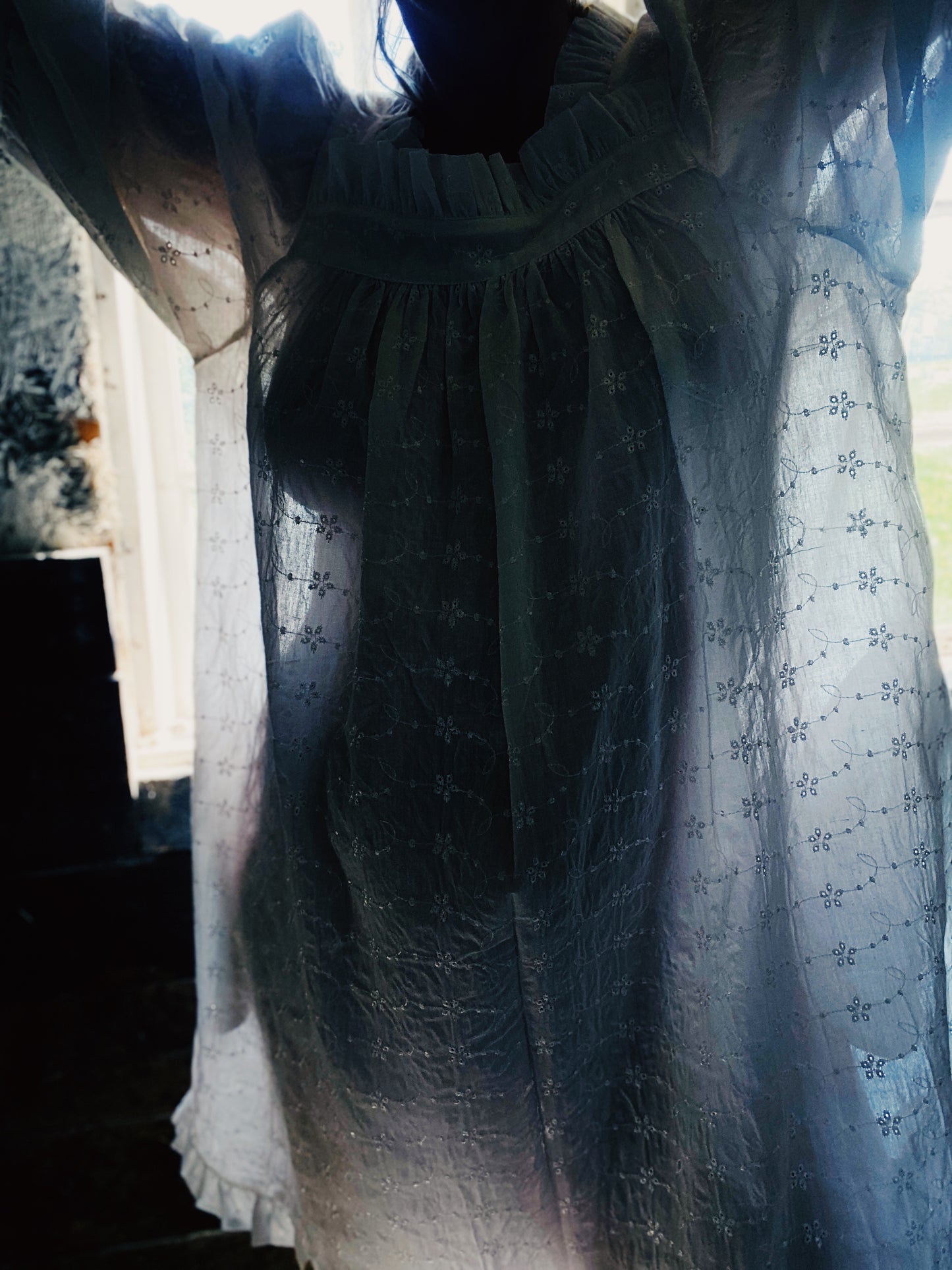 Sleeper mini dress in broderie anglaise