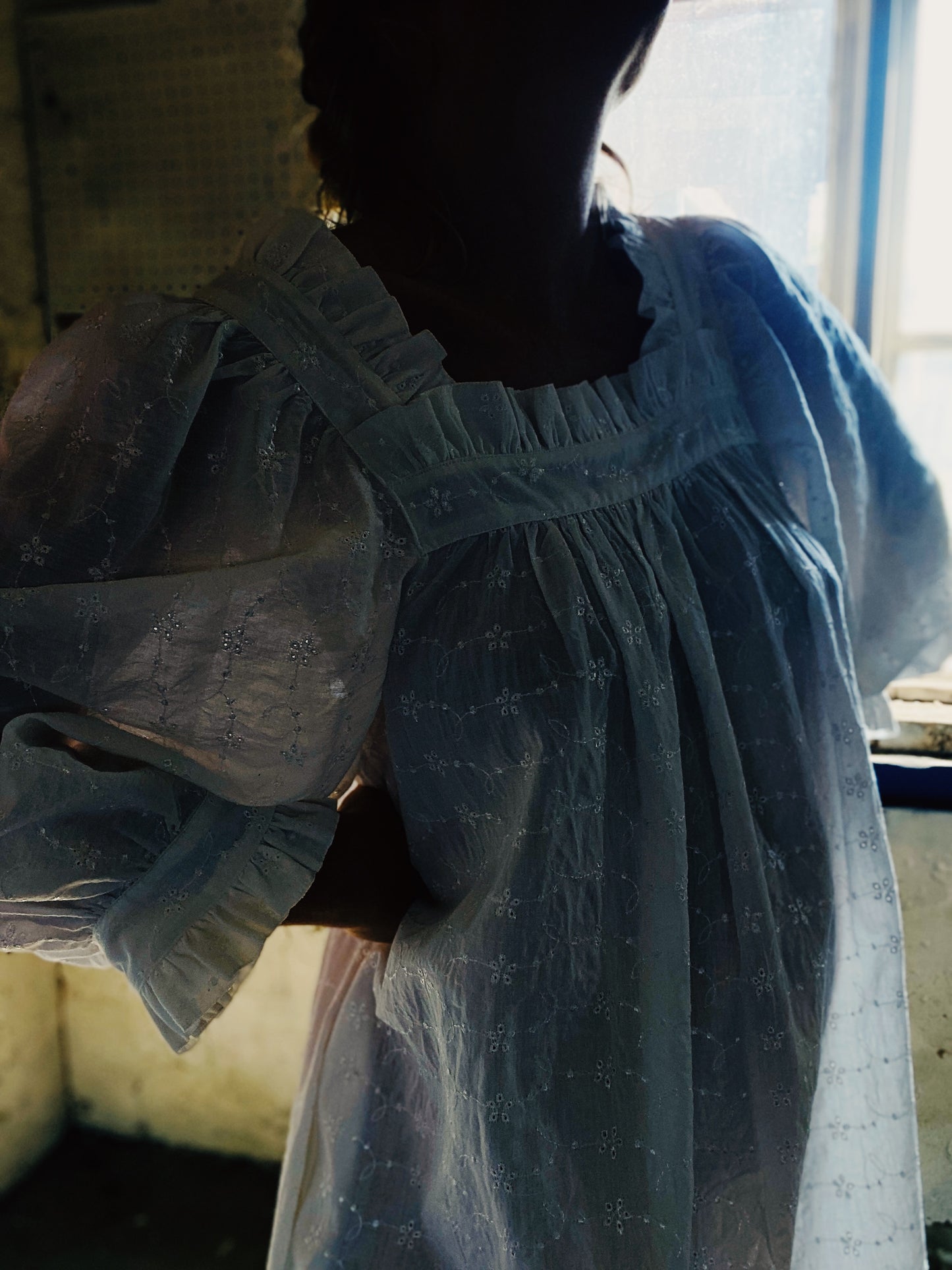 Sleeper mini dress in broderie anglaise